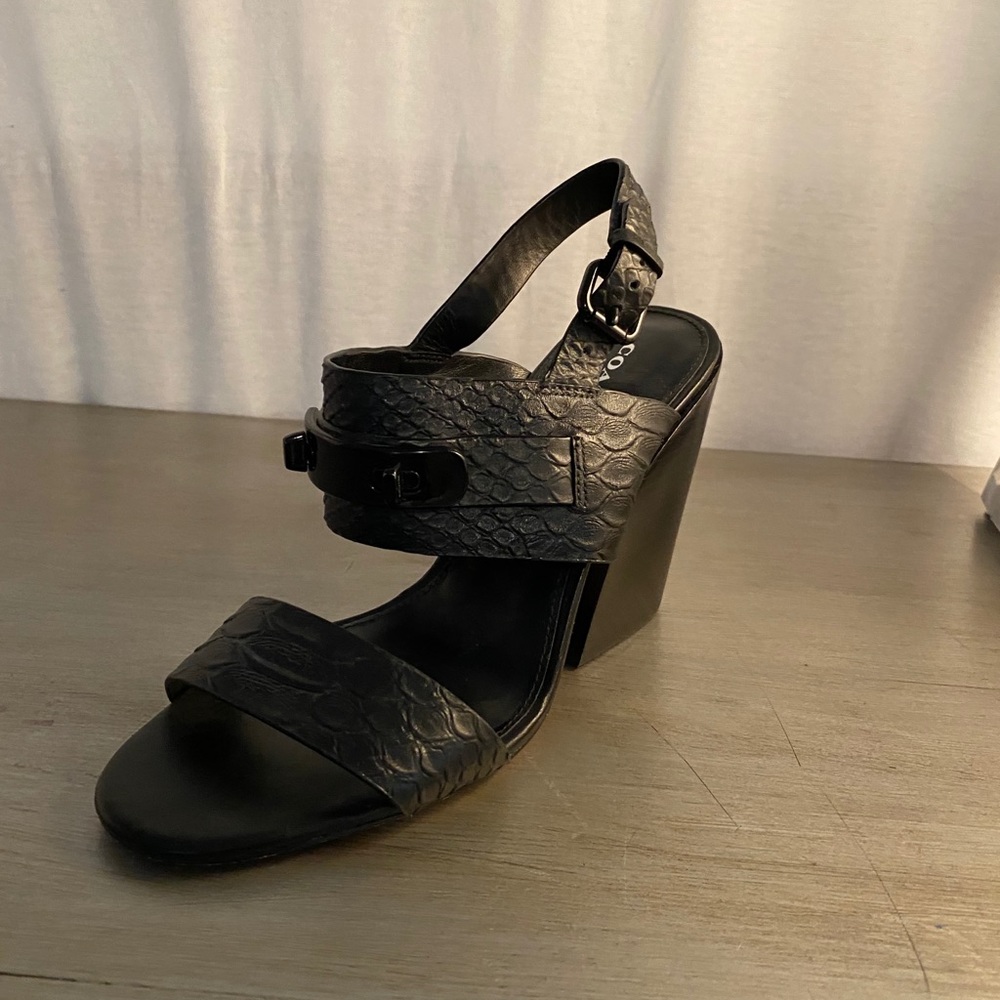 Coach chunky heeled sandals.
